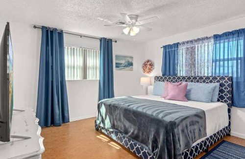 Upper Grand Lagoon House | Flirty Flamingo with Private Heated Pool, Game Room, and AMAZING Covered Outdoor Living