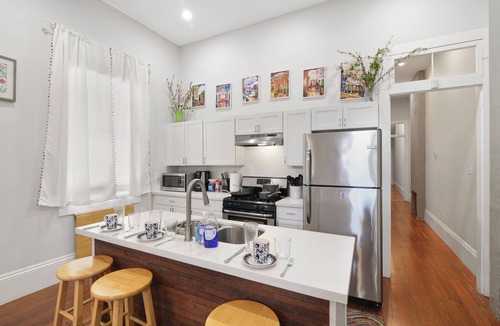 Saint Claude House | Flower Pool Hall- 9 Beds/4BA NOLA Style, Fenced in Yard, Karaoke Machine & Grill