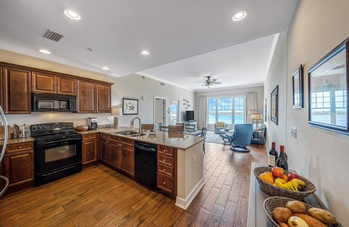 Upper Grand Lagoon Condo | FREE Daily Golf! Reflections 805 Amazing Top Floor View, Resort Pool, Hot Tub