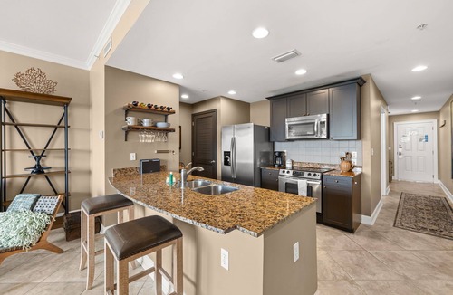 Upper Grand Lagoon Condo | FREE Daily Golf! Reflections 406 Amazing Views, Heated Resort Pool & Hot Tub!