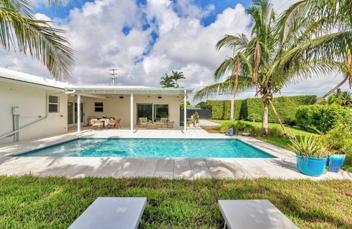 Lake Clarke Shores House | Fully upgraded waterfront pool home, centrally located in West Palm Beach!