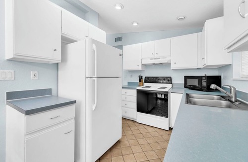 Sugarwood Beach House | Gone to the Beach cozy small home located near beach
