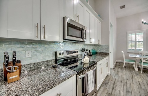 Pelican House | Gorgeous 4 bed 3 bath home with Indoor/Outdoor Living, Private Pool & Hot Tub
