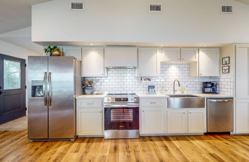 Fort Walton Beach House | Gorgeous waterfront coastal cottage with dock, Wifi, & private washer/dryer