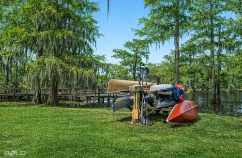 Uncertain House | Grand Harbor Lakefront Kayaks, Canoes & Views