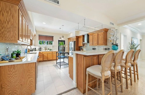 Northwood Shores House | Grand Palm Villa: 6BR+ Oasis, Steps from Ocean