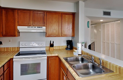 Pensacola Beach Condo | Great Location Right on the Water – Large Community Pool!