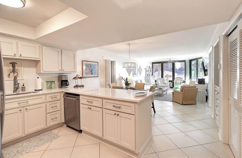 Upper Grand Lagoon Condo | Ground Floor Condo with Shared Pool, Golf Access, Bay Views, and WiFi