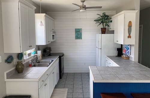Waveland Cottage | Ground-level home steps from the beach in Waveland!