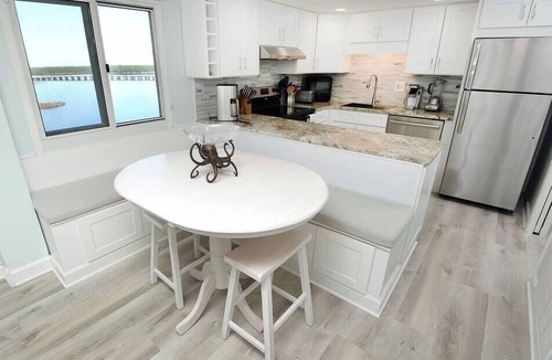 Sunnyside Condo | Gulf- AND Lake-front balconies at beach resort