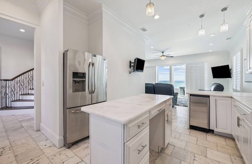 Delos House | Gulf Front Home with Private Pool, In-Home Elevator and Movie Theatre