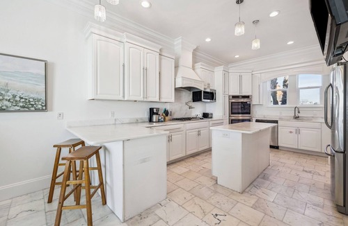 Delos House | Gulf Front Home with Private Pool, In-Home Elevator and Movie Theatre