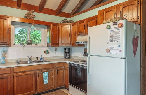 Sea Palm Village House | Gulf Views. Steps to beach and pool. Pets ok. Beautiful, lush property.