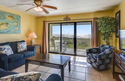 St. George Island Condo | HEAR THE ROAR of the ocean and the slow flapping of the blue herons.