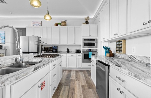 Henderson Point House | Heron Retreat | Luxury Beach House with Heated Pool