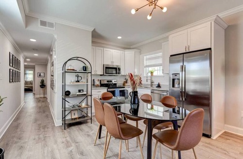 Tulane - Gravier Apartment | Historic 3BR Mid-City home by Lafitte Greenway. Sleeps 6, patio, Wi-Fi, Smart TVs, walk to Superdome