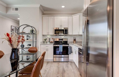 Tulane - Gravier Apartment | Historic 3BR Mid-City home by Lafitte Greenway. Sleeps 6, patio, Wi-Fi, Smart TVs, walk to Superdome