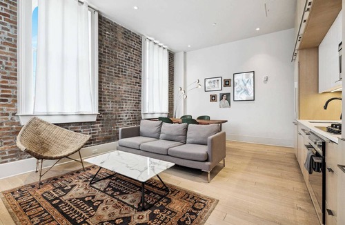 Tulane - Gravier Apartment | Historic Schoolhouse 1BR Apartment Near UMC | Parking + Gym