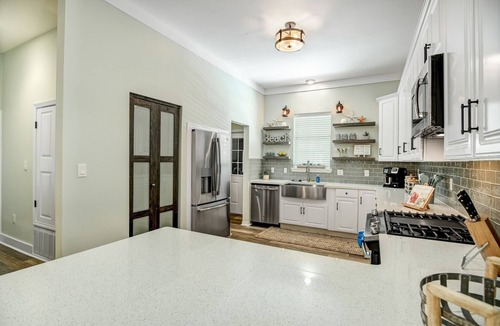 Sugarwood Beach House | Huge heated pool Close to beach and Seaside, 6 seat Gem car