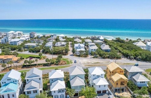 SeaNest Village House | includes golf cart! SeaNest stunner with Gulf views, 4 adult bikes. EV charger