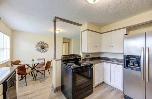 Beaumont Apartment | Indoor fireplace with patio and pool table