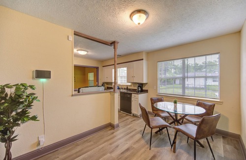 Beaumont Apartment | Indoor fireplace with patio and pool table