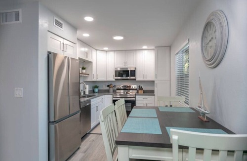 Mid Island House | Island Homes-on canal w/dock and heated pool/5 min walk to beach