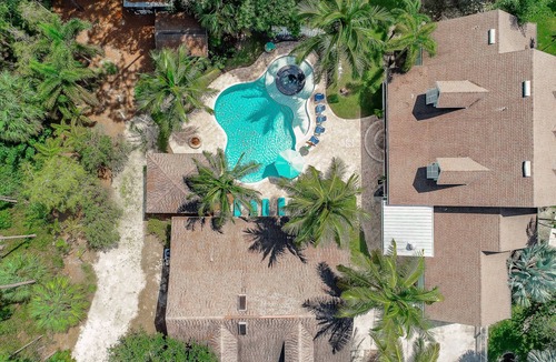 Oakes Estates House | Key West Style Luxury Home with resort style heated pool and infinity line spa