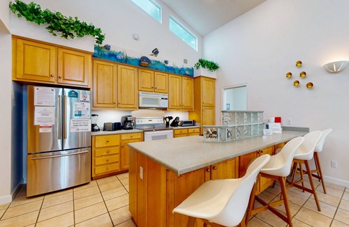 Silver Sands House | Lagoon-front home with dock & soaking bathtub
