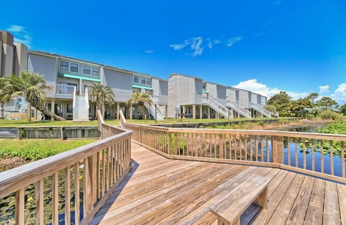 El Centro Beach House | Lakefront Getaway w/ a Shared Pool, Furnished Deck, Free WiFi, & Central A/C