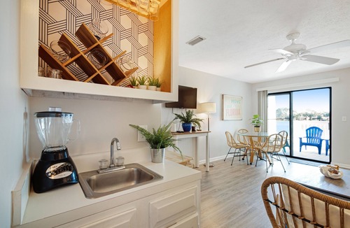 El Centro Beach House | Lakefront Getaway w/ a Shared Pool, Furnished Deck, Free WiFi, & Central A/C