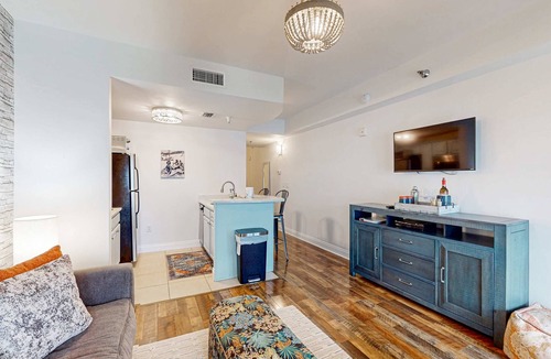 Sunnyside Apartment | Lakefront resort condo with heated outdoor pool, hot tub, balcony, lake views