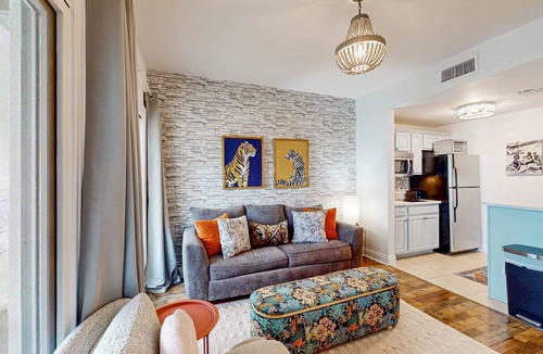 Sunnyside Apartment | Lakefront resort condo with heated outdoor pool, hot tub, balcony, lake views