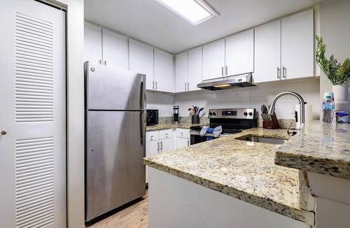 Interchange Square Apartment | Landing | Chic 1BD, Tennis Court, Gym