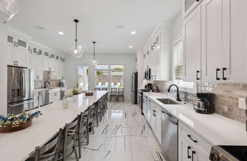 Tang-O-Mar House | Large Miramar Home with Pool and Spa, Game Room, Foosball, Elevator and 8 Bikes