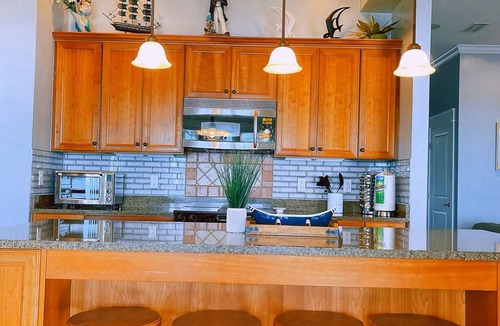 Carrabelle House | Lily’s Escaped, Private screen cover pool, fishing dock,