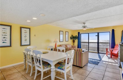 St. George Island Condo | Located right on the beachfront, this bright, cheerful and beautiful well-appointed Villa.