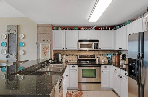 Panama City Beach Condo | LUXURIOUS Calypso Condo Nicer than rest-Private Parking space! Beach Chairs! +