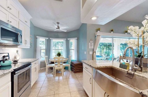 Diplomat House | Luxury coastal retreat with office, lanai, pool, alfresco dining & tiki bar