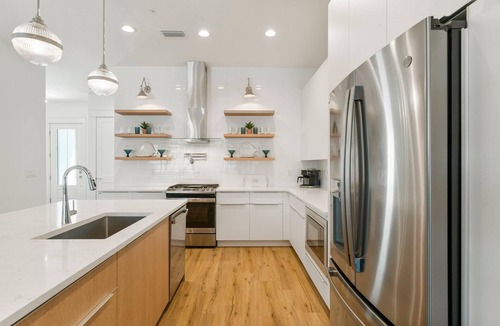 Silver Sands Beach House | Luxury custom townhome with private heated pool & elevator!