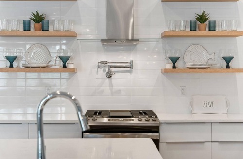 Silver Sands Beach House | Luxury custom townhome with private heated pool & elevator!