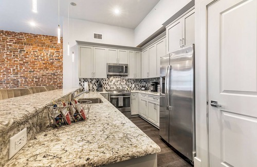 Arts/Warehouse District Condo | 🎷Luxury Historic Downtown Location LG Private Balcony | The Armstrong 🎷