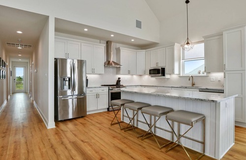 Waveland House | Luxury home with HEATED pool and spa on the Beach!
