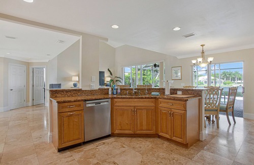 Crown Pointe House | Luxury Lakefront Home with Pool, 2 King Suites, 4 BR 5 BA Near 5th Ave & Beaches