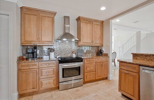 Crown Pointe House | Luxury Lakefront Home with Pool, 2 King Suites, 4 BR 5 BA Near 5th Ave & Beaches