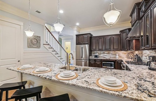 WaterSound West Beach House | Luxury retreat with screened porch, BBQ, pond view, firepit, pool & beach access