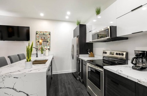 Faubourg Lafayette Villa | Luxury Rooftop Villa mins from French Quarter and Superdome