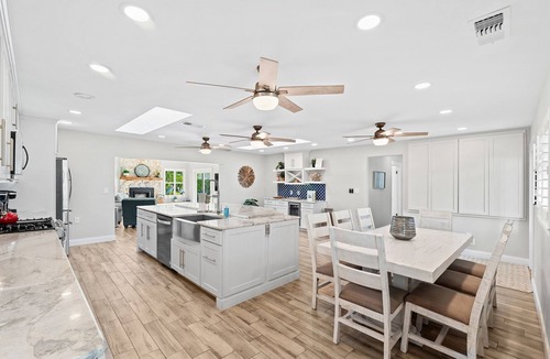 Convair Cove House | Luxury Waterfront Oasis w/Saltwater Pool, Boat Dock & Fire Pit! 🌊
