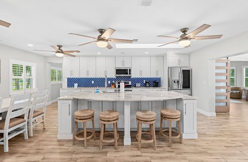 Convair Cove House | Luxury Waterfront Oasis w/Saltwater Pool, Boat Dock & Fire Pit! 🌊