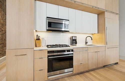 Tulane - Gravier Apartment | Modern 1BR in Historic Schoolhouse | Gated Parking | Near Superdome